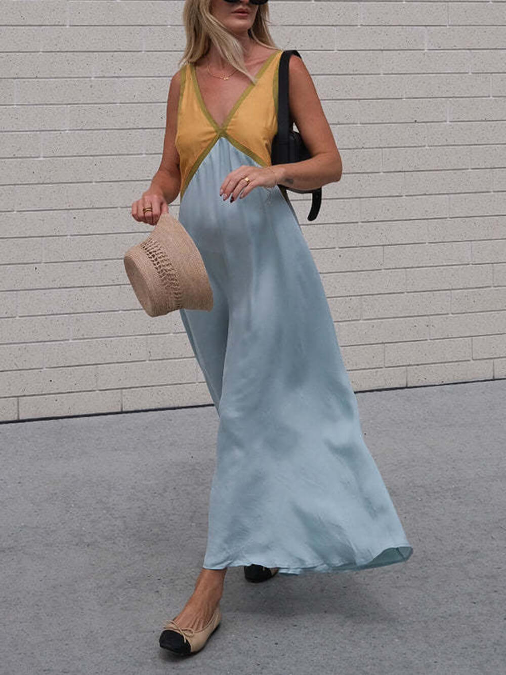 Vestido elegante con escote en V y paneles de color en contraste