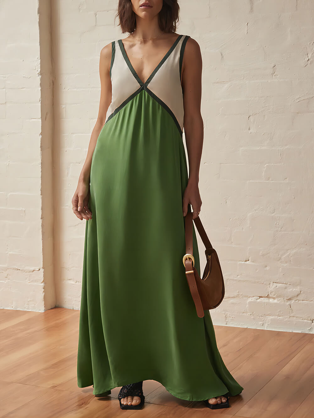 Vestido elegante con escote en V y paneles de color en contraste